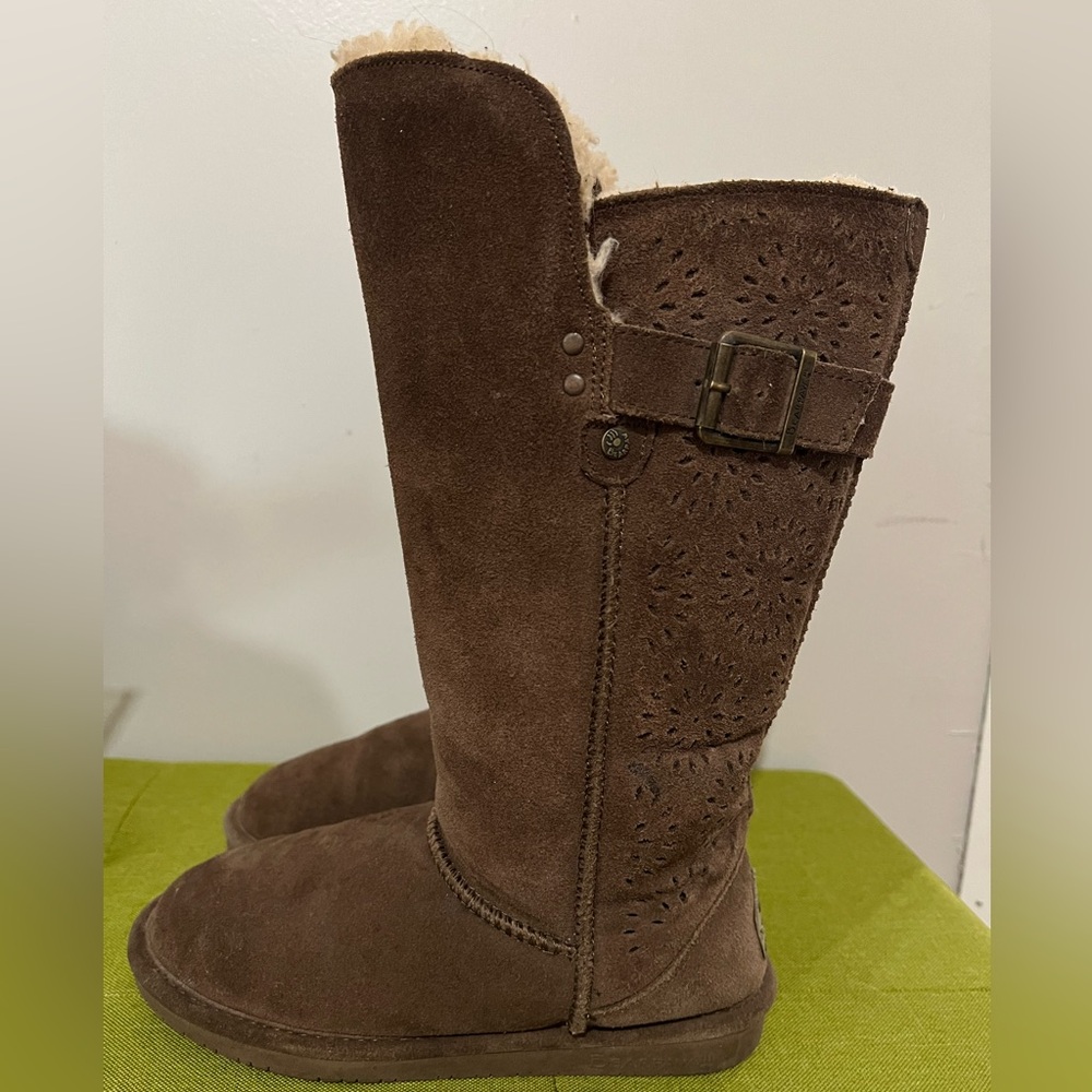Tall Bearpaw boots with pattern and buckles